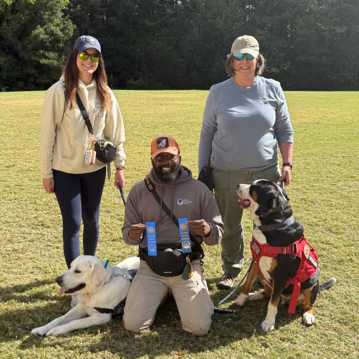 Cosmo and Archie, the dynamic duo/bffs, both passed their Canine Good Citizen (CGC) tests today. Not pictured but also passing was Finnegan Fox, a swetheart lab who's headed for work as a therapy dog. Look how proud and lovingly Archie looks at Kyle, his primary trainer! We're proud of the work they and their moms put in to become official Canine Good Citizens! 

The Amerian Kennel Club says The purpose of the CGC Program is to ensure that our favorite companion, the dog, can be a respected member of the community because it has been trained to be well behaved in the home, in public places, and in the presence of other dogs.

If you want that level of behavior and respect for your dog, give us a call. 

919.998.6772